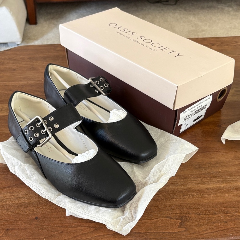 Black leather Mary Jane’s